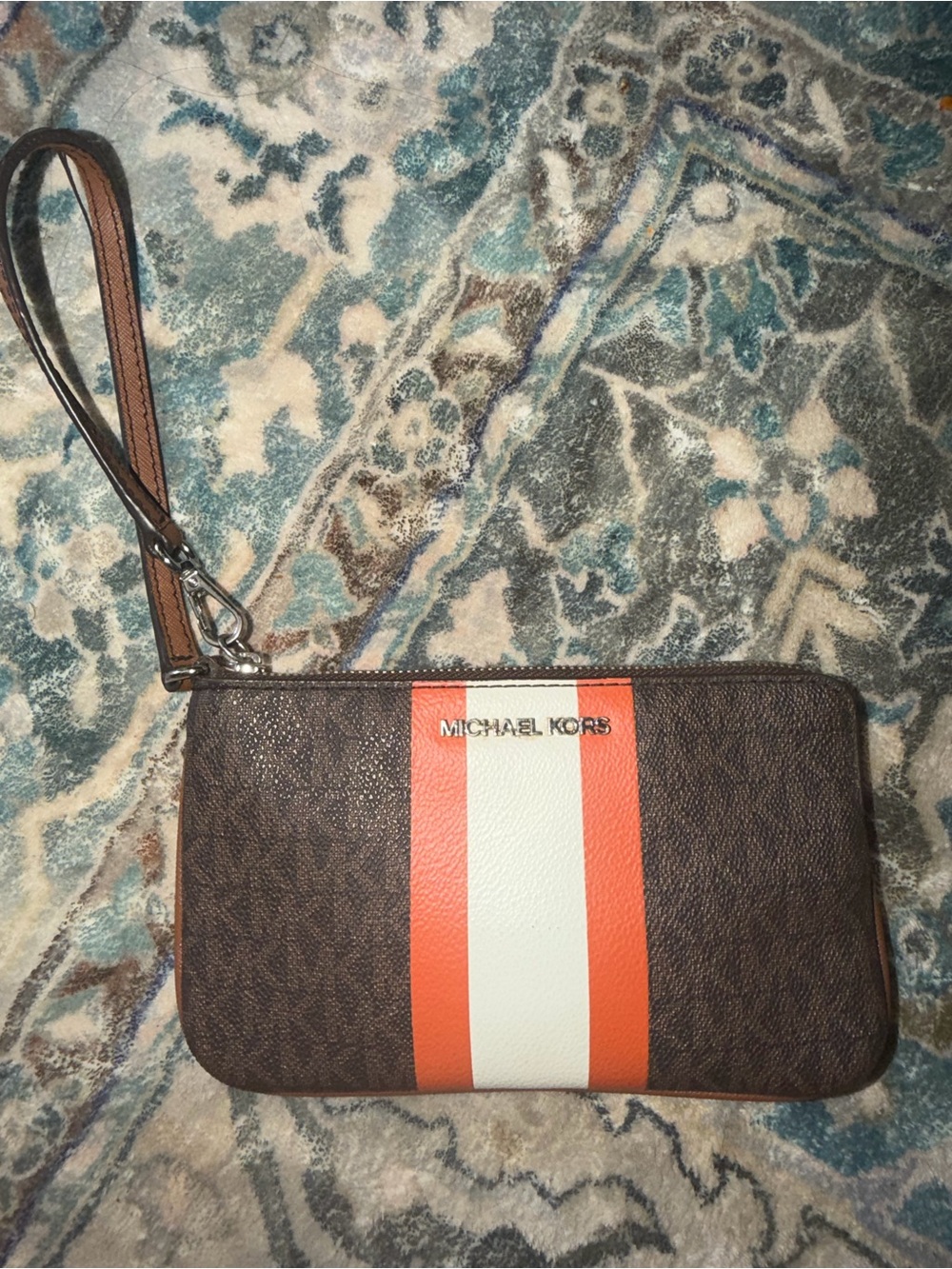 Michael Kors Brown Wristlet with Orange and White Center Stripe